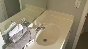 Hair dryer, towels, toilet paper