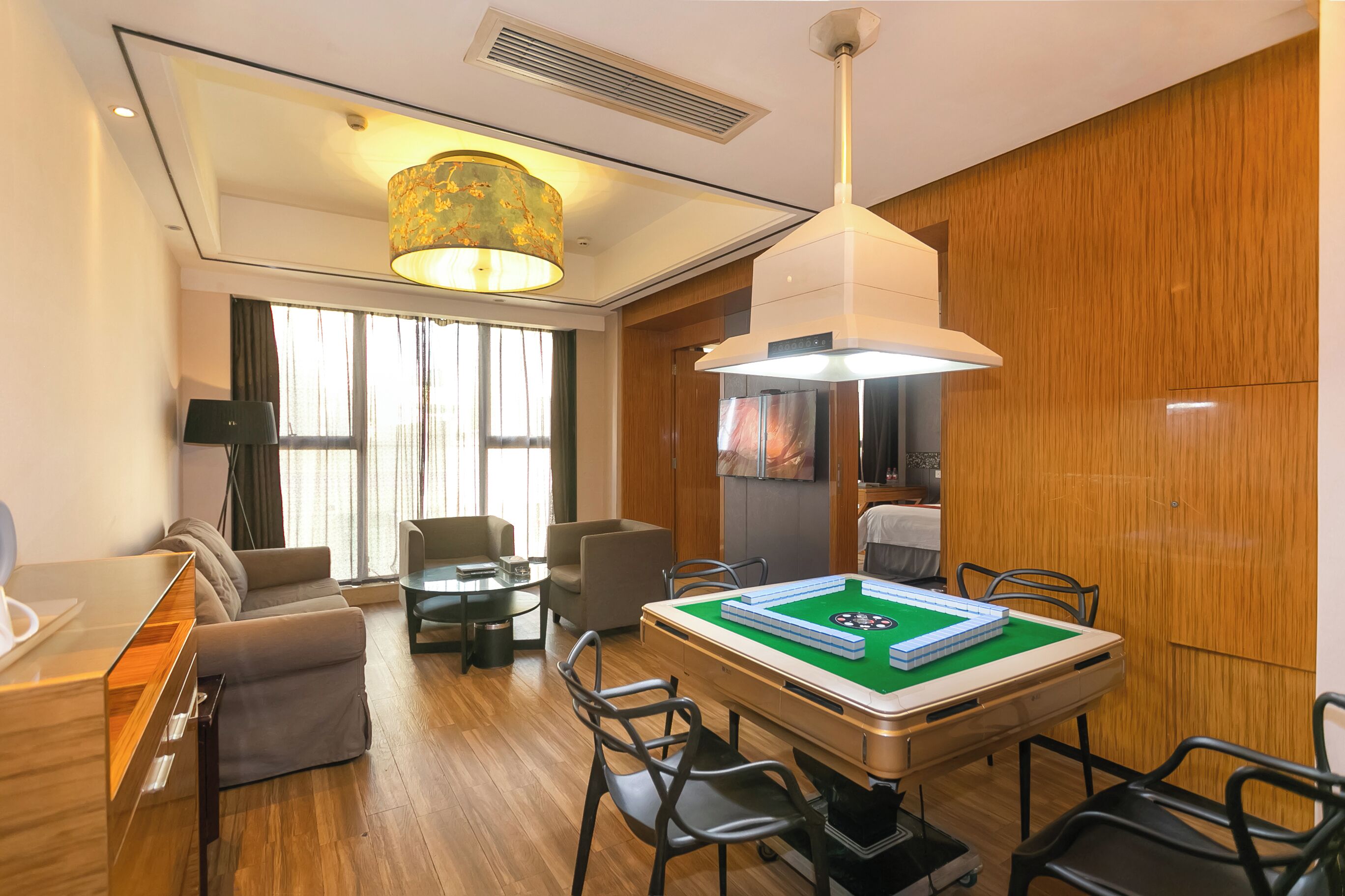 Suite empresarial, vista a la ciudad | Área de sala de estar