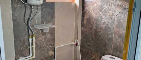 Shower, towels, soap, shampoo