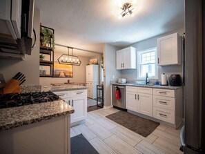 Fridge, microwave, stovetop, dishwasher - Walkable KC House: 3BR Near Shops & Dining (Kansas City)