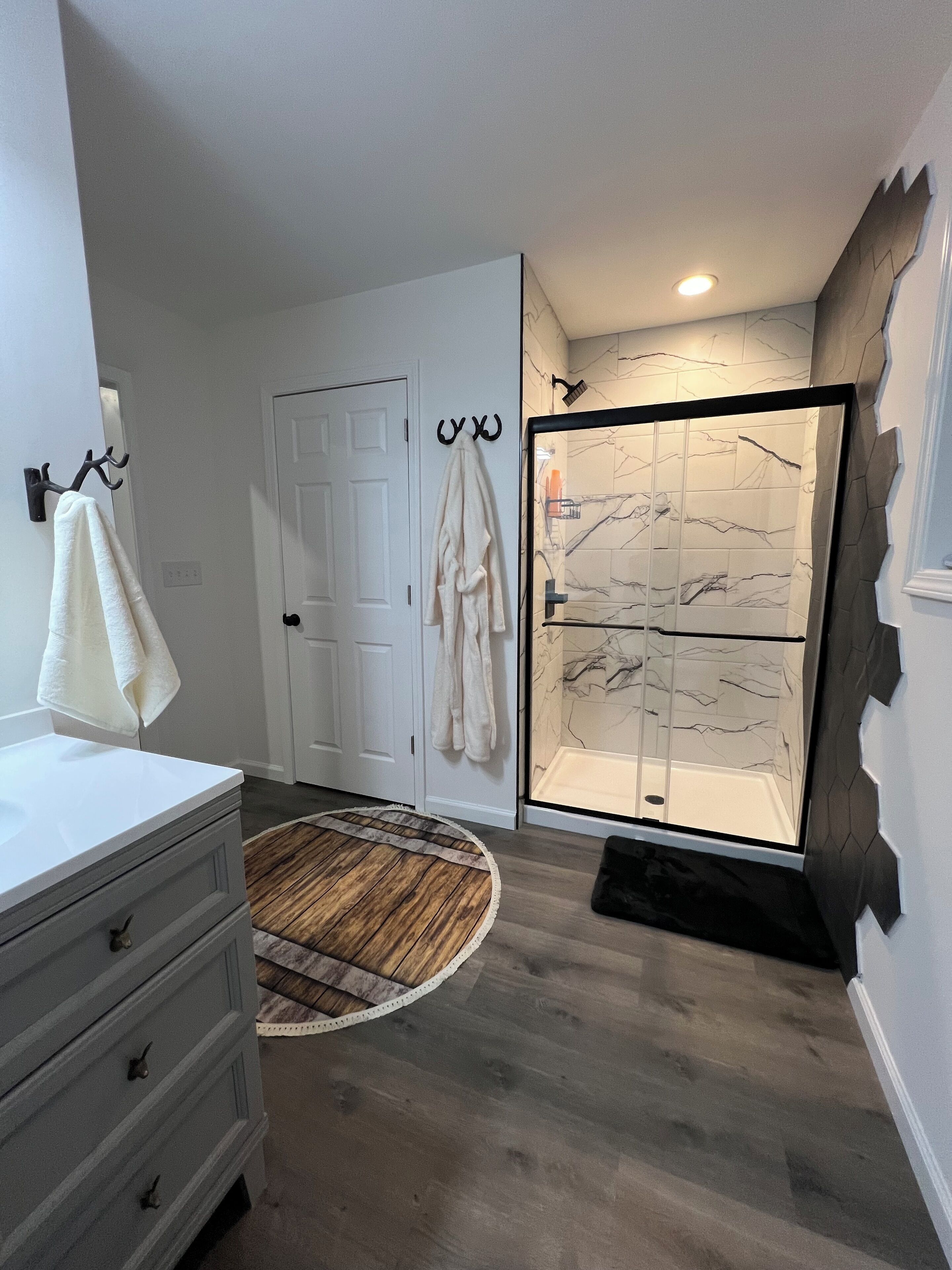 Shower, hair dryer, towels, soap