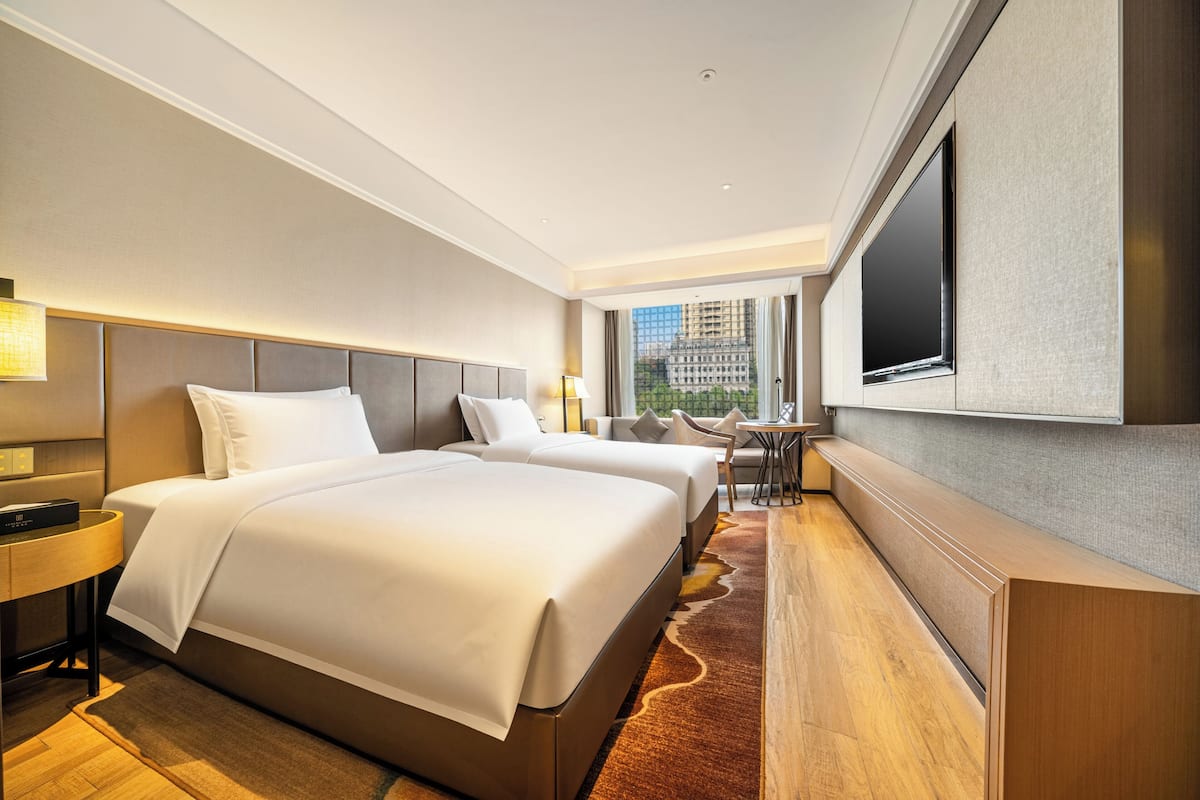 基础双人房 | 高档床上用品、羽绒被、加厚床垫、免费迷你吧物品