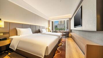 Premium bedding, down duvets, pillow-top beds, free minibar items