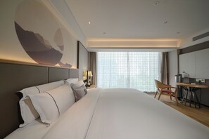 ห้องซิตี้ซิงเกิล | เครื่องนอนระดับพรีเมียม, ผ้านวมขนเป็ด, เตียงพร้อมฟูกเสริมที่นอน