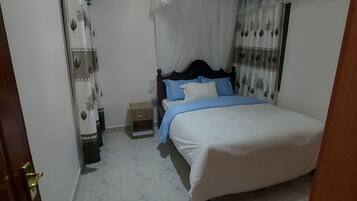 2 dormitorios, tabla de planchar con plancha, wifi y ropa de cama