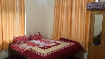 Habitación doble | Camas supletorias y ropa de cama