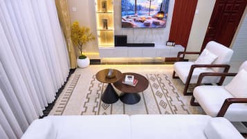 Family Apartment, Balcony, City View | Living area