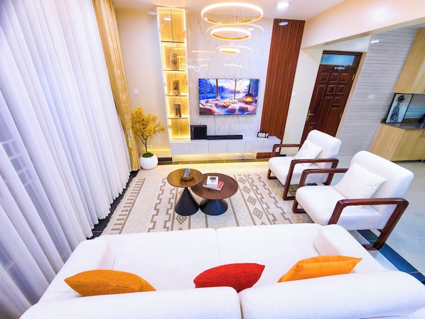 Family Apartment, Balcony, City View | Living area - Charm Luxe Homes (Kampala)