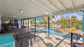 Family House, 4 Bedrooms, Lanai, Canal View | Pool | Outdoor pool, pool umbrellas, sun loungers