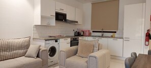 Fridge, microwave, stovetop, dishwasher - Royal Hawana Apartment salalah (Salalah)