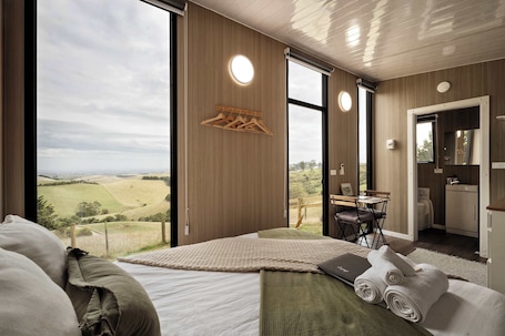 1 bedroom, bed sheets. Sunset Hill by Tiny Away