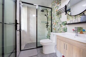 Shower, hair dryer, towels, soap