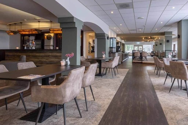 Gather comfortably with plenty of space between tables.