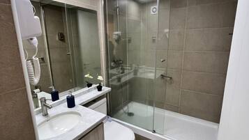 Hair dryer, towels, soap, toilet paper