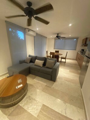 Apartamento, 1 quarto | Área de estar