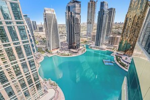Pool - Free housekeeping visits during your stay - StayShort - Trendy 1BR in JLT that Sleeps 4 with Lake Views! (JLT)
