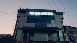 A building with a sign reading "THE PFNL RESIDENCY". - The PFNL Residency (Gohana)