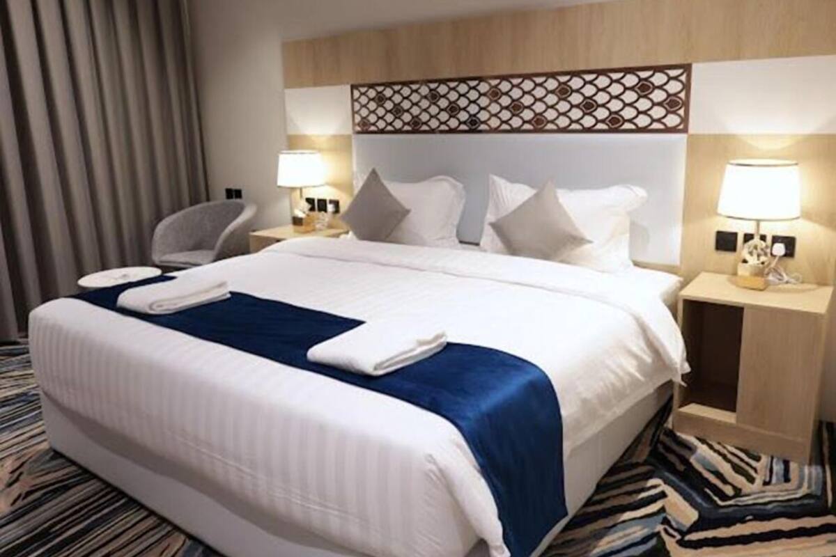 Luxe beddengoed, bedden met traagschuimmatrassen, een minibar