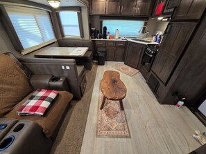 Interior - Cozy RV at Rocky Creek Ranch Hot Tub Pet Private (Fredericksburg)