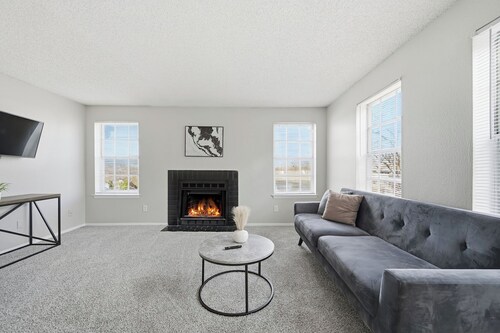 Comfortable layout with fireplace and dining area