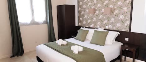 Classic Room | Blackout drapes, iron/ironing board, free WiFi, bed sheets