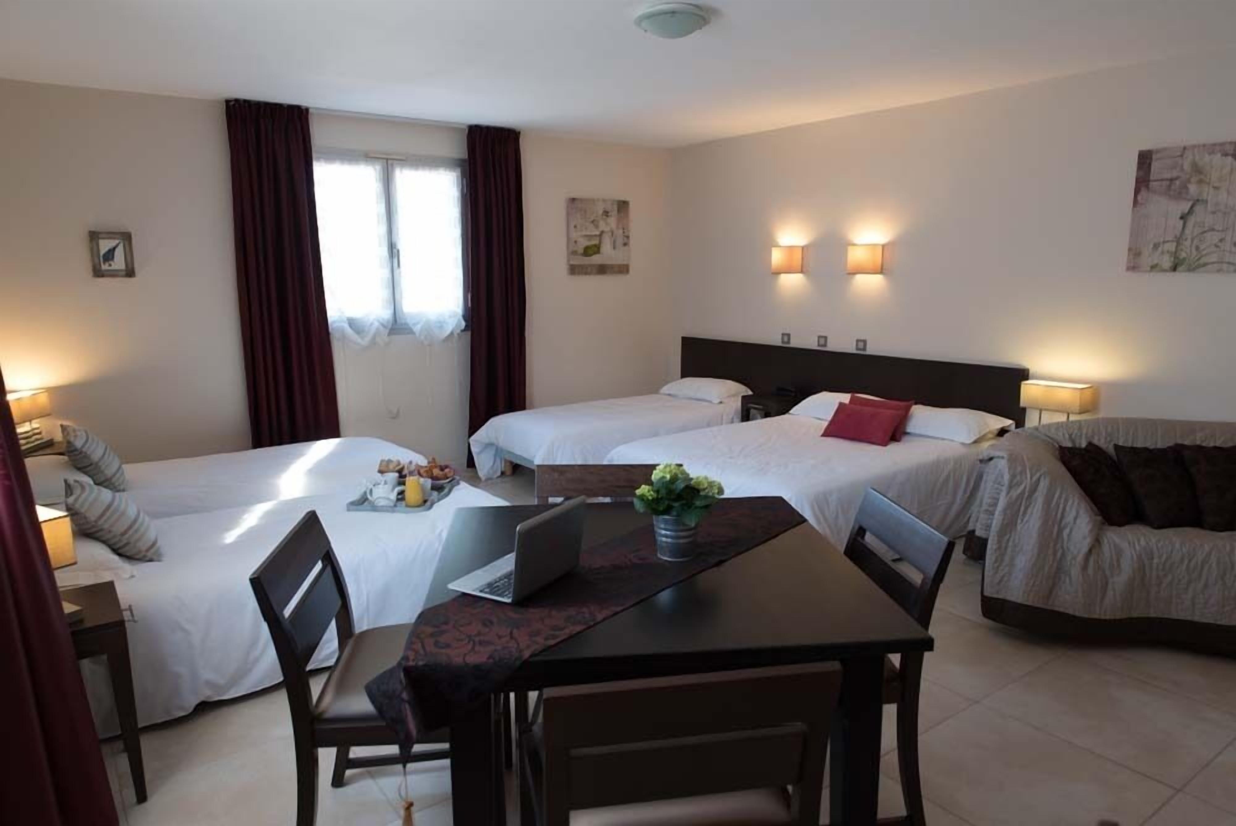 Family Room | Blackout drapes, iron/ironing board, free WiFi