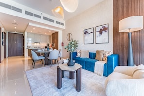 TV - High-Floor Balcony with Burj Khalifa View & Asst Room, Minutes from Burj Plaza (Dubai)