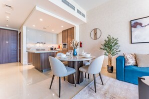 Dining - High-Floor Balcony with Burj Khalifa View & Asst Room, Minutes from Burj Plaza (Dubai)