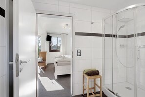 Regadera y secadora de cabello 