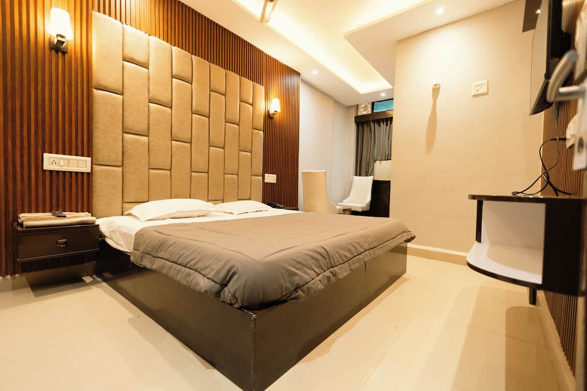 Desk, laptop workspace, blackout curtains, free WiFi