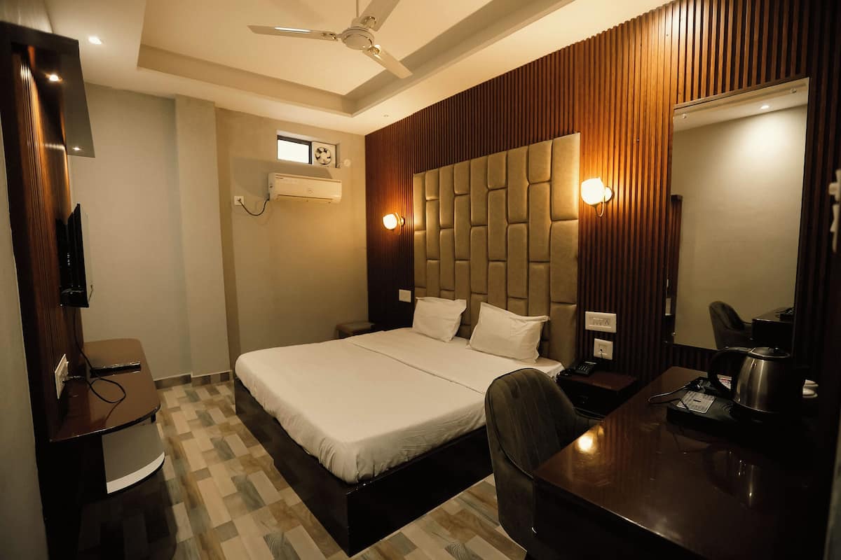 Desk, laptop workspace, blackout curtains, free WiFi