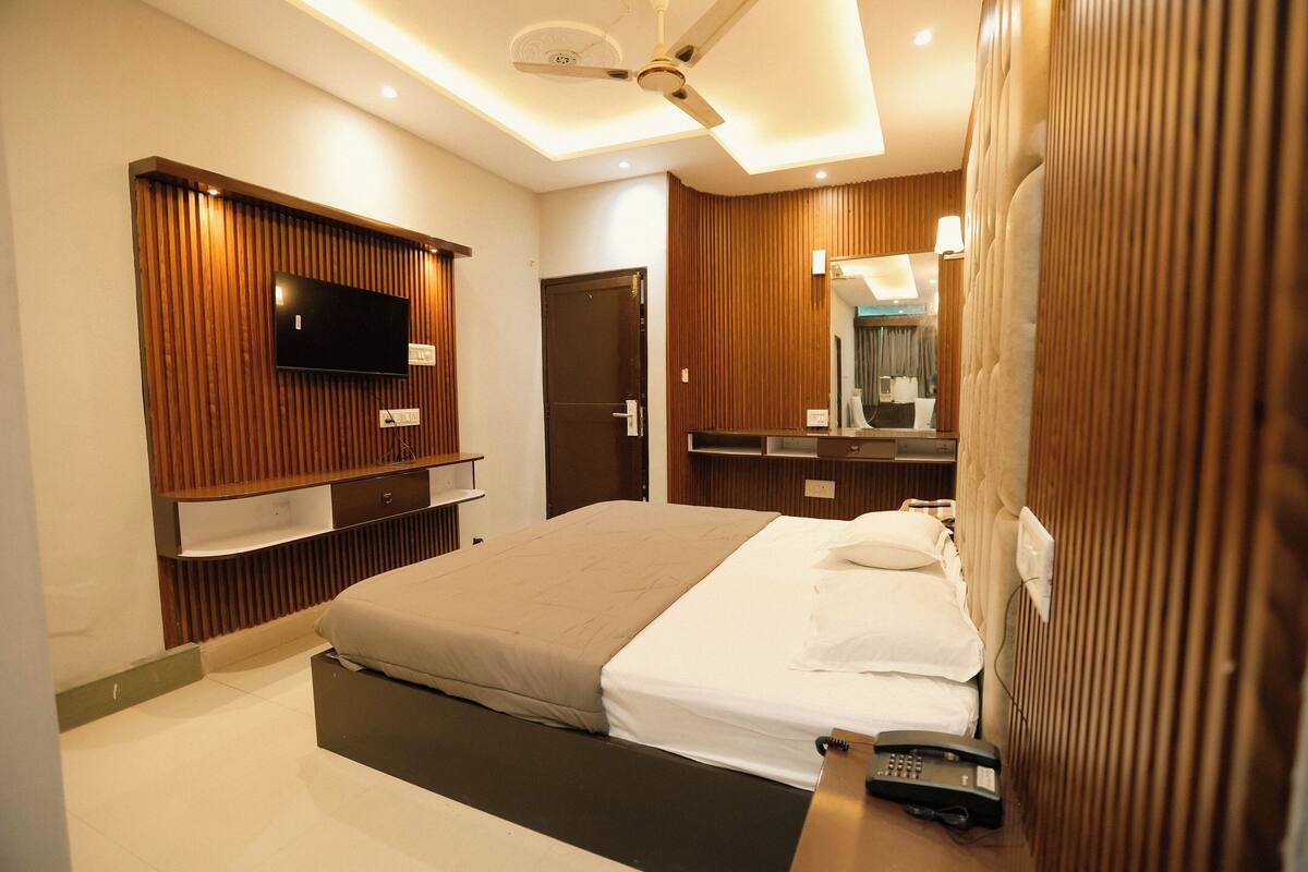 Desk, laptop workspace, blackout curtains, free WiFi
