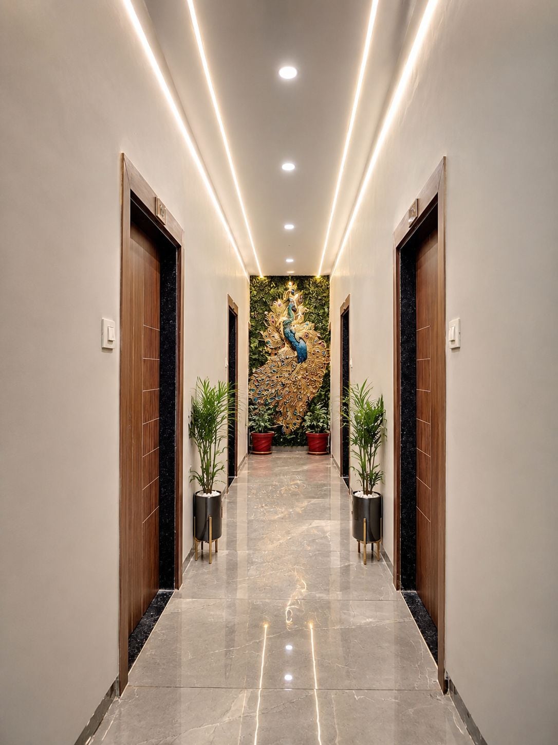 A hallway with wooden doors, potted plants, and a peacock mural on the wall.