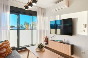 Smart TV - Las Dunas 213 - by Welcomely (Oliva)
