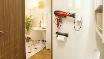 Hair dryer, bidet, towels, soap