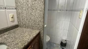 Shower, free toiletries, towels, toilet paper