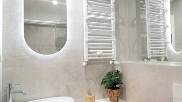 Hair dryer, towels, soap, toilet paper