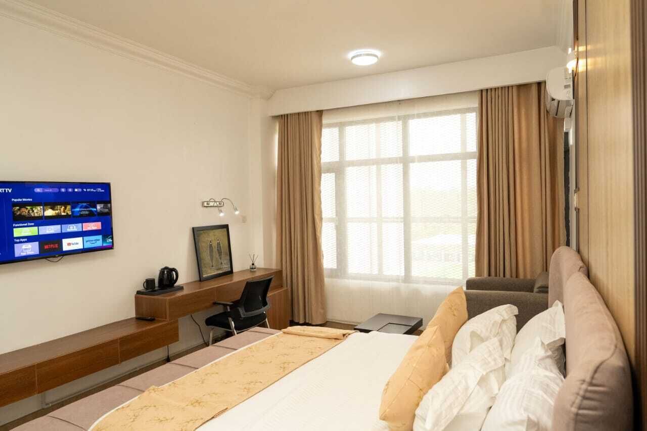 Deluxe Double Room, Garden View | Desk, laptop workspace, free WiFi