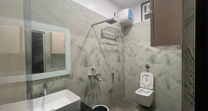 Shree LaadliJu Kothi 1BHK where modern luxury meets the warmth of a managed home