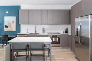 Appartement (1 Bedroom) | Cuisine privée | Réfrigérateur, cafetière/bouilloire
