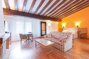 Junior suite, uitzicht op tuin | Woonruimte