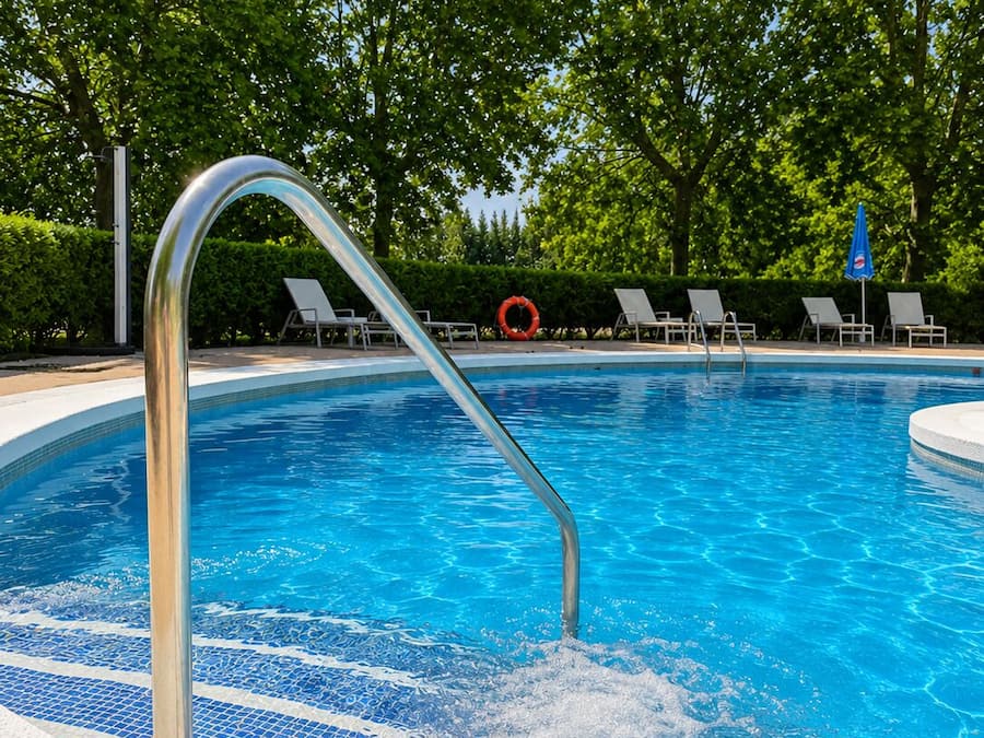 Seasonal outdoor pool, lifeguards on site