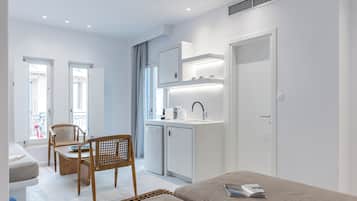 Suite, Balcony, City View | In-room safe, iron/ironing board, free WiFi
