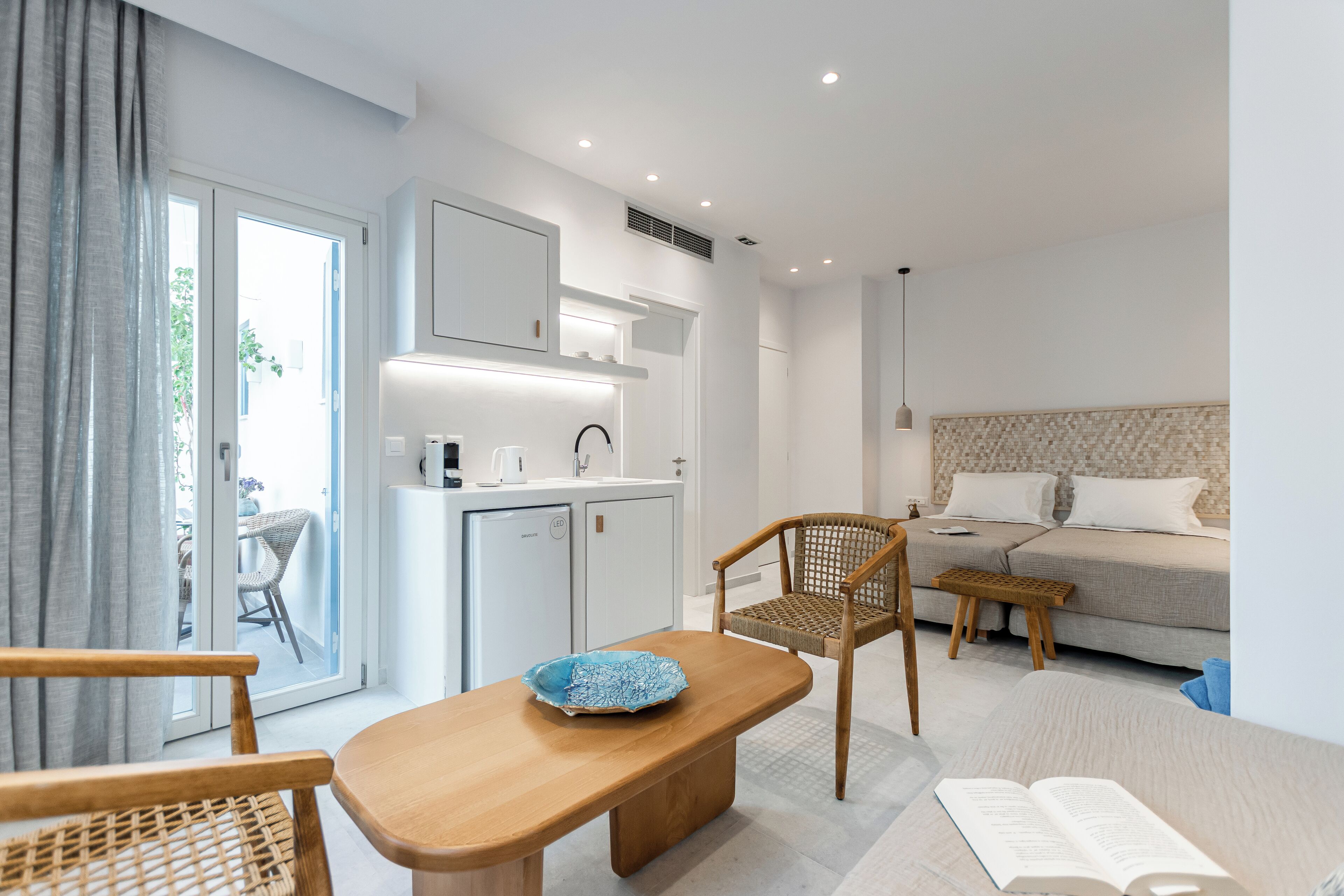 Suite, Balkon, Stadtblick | Zimmersafe, Bügeleisen/Bügelbrett, kostenloses WLAN