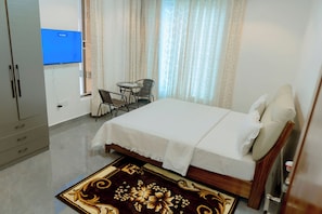 Comfort Double Room, Park View | Desk, laptop workspace, iron/ironing board, free WiFi - DORLAN HOTEL (KIGALI CITY)