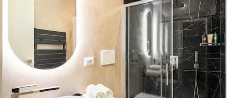 Deluxe Studio, Kitchenette | Bathroom | Free toiletries, hair dryer, towels, soap