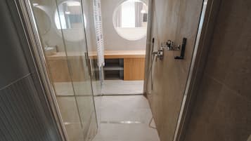 Business Double Room Single Use, Balcony, Beach View | Bathroom | Shower, hair dryer, towels, soap