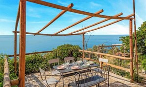 Outdoor dining - Blu Isola, located in Prevo, a few minutes drive from Corniglia, is the perfect choice for a family or group of friends.The outdoor terrace, with barbecue available, is the perfect place to relax and admire the breathtaking sunsets over the Cinque Terre  (Vernazza)