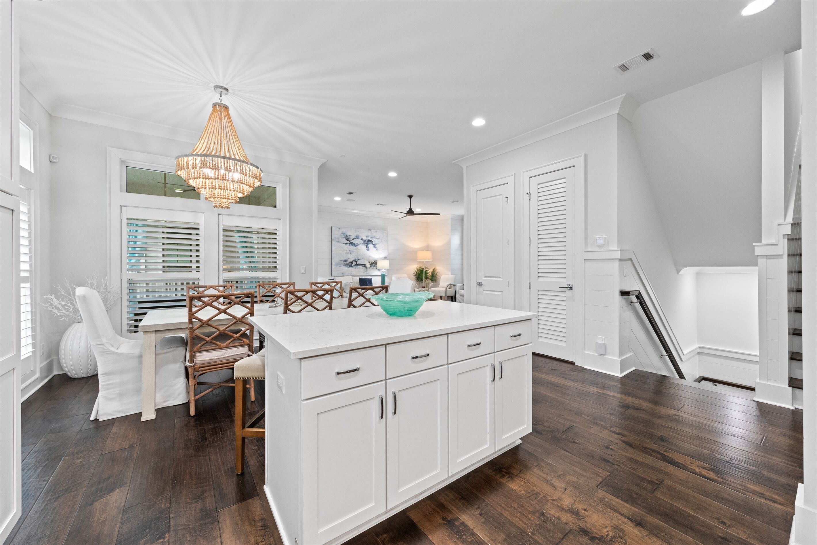The oversized kitchen island offers generous serving space and additional dining with barstool seating, making it perfect for breakfast with kids and teens, casual lunches, or appetizers while meals come together. A natural gathering spot!