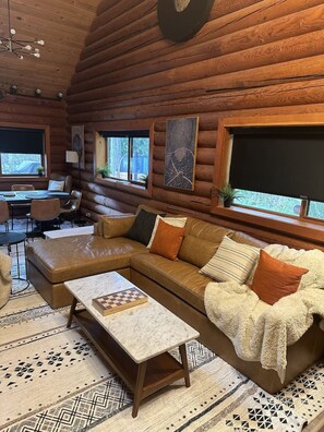 TV, fireplace, books - Mountain + Riverfront cabin w/ hot tub + sauna (Granite Falls)